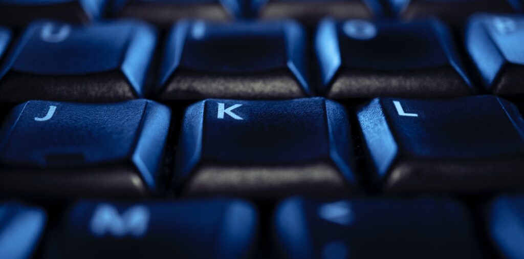 black computer keyboard on white surface